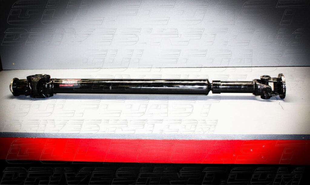 1310 Series front and rear driveshaft for 2018+ Jeep JL, featuring solid black tubing and durable U-Joints.
