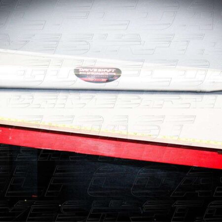 4-inch aluminum driveshaft for 2009-15 Cadillac CTS-V, featuring performance U-joints and a sleek silver finish.